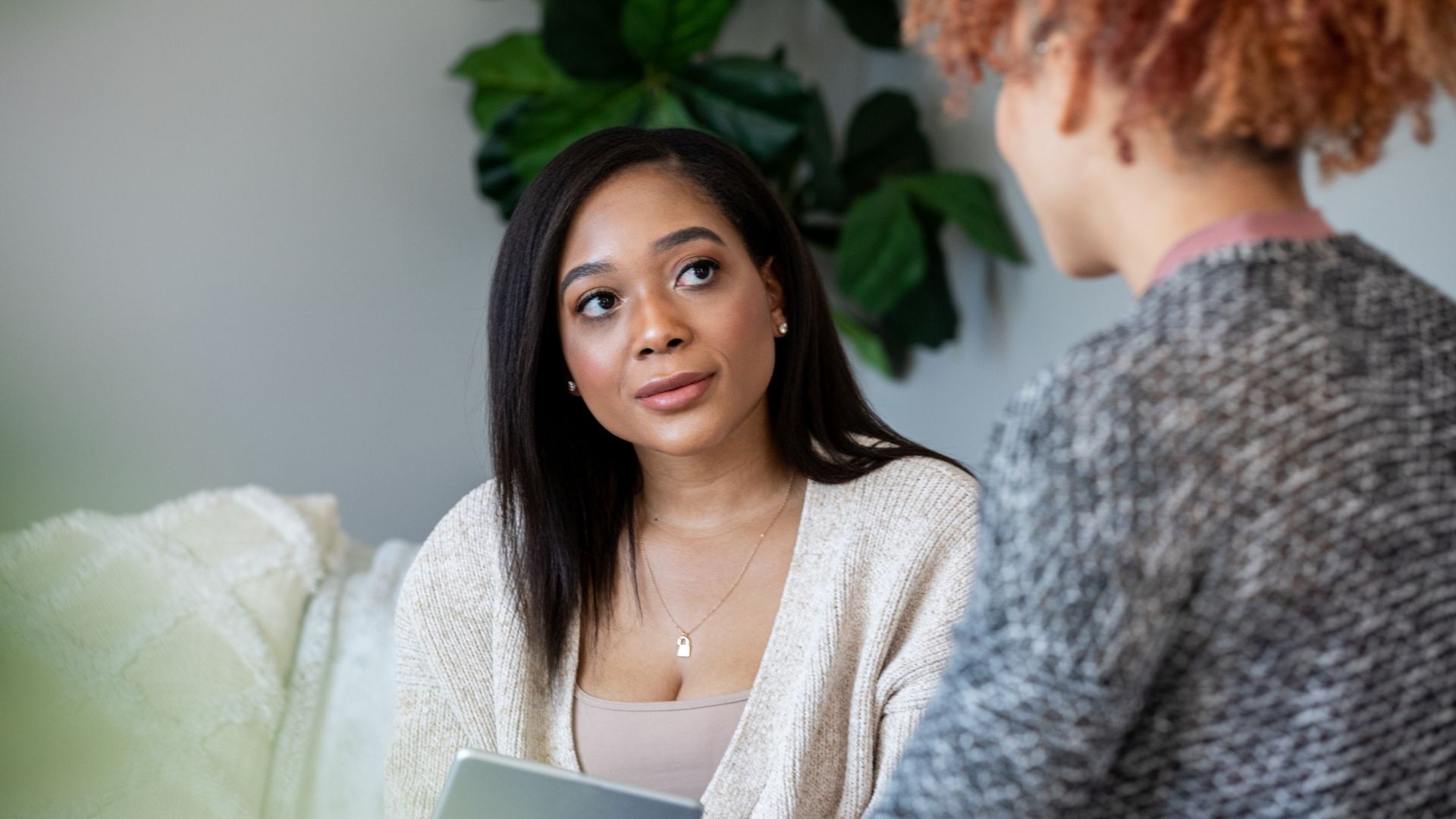 Two people having a counselling meeting.