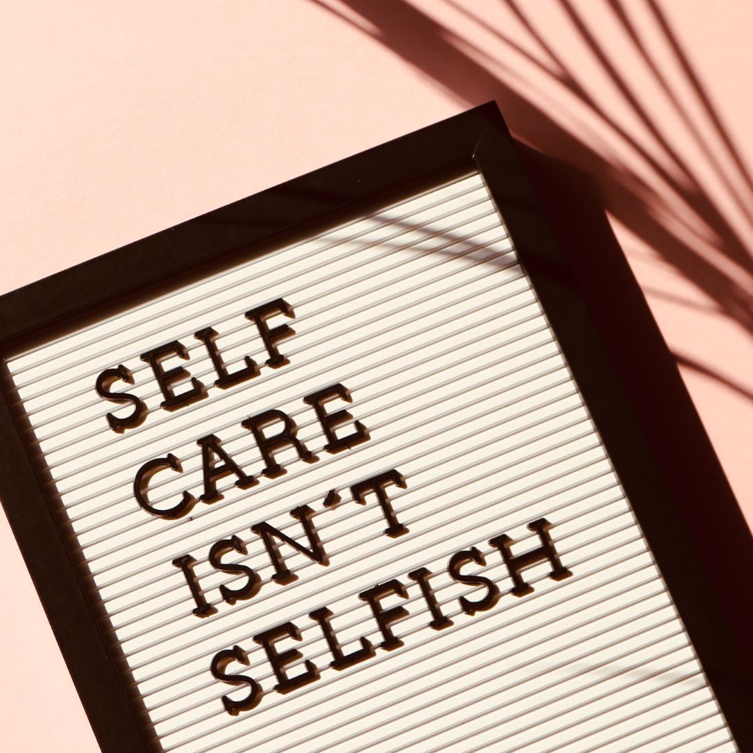 Sign with text self care isn't selfish