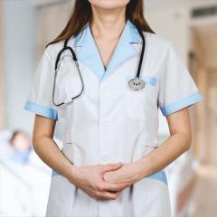 Close-up of a medic with stethoscope around her next