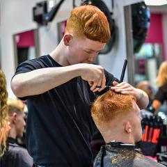 Barber cutting someone's hair