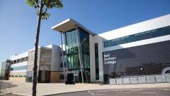 East Durham College Peterlee campus building exterior with a bright blue sky