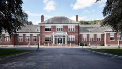 Front aspect of East Durham College's main front building at Houghall looking down the front driveway