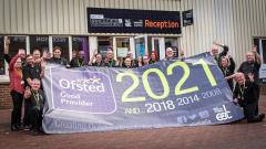 East Durham College Technical Academy staff holding a banner that says Ofsted GOOD 2021