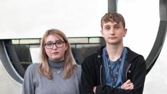 A photo of Hollie Ferguson and her brother Jacob Brown looking to camera with a blurred background