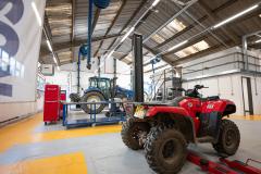 Landbased Engineering workshop with tractor and quadbike inside